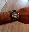 Customer picture of Tissot Męski zegarek kwarcowy t-race z czarną tarczą z pozłacanymi akcentami T1154173705100